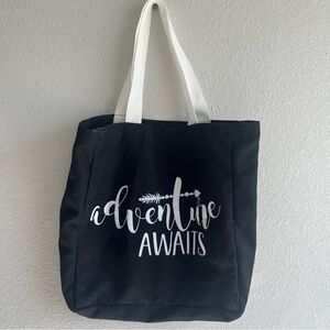 adventure awaits black and white tote